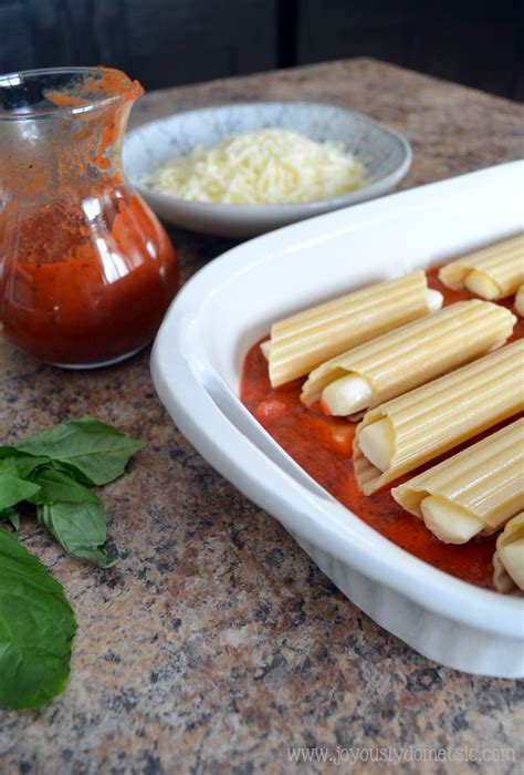 String cheese manicotti - I have a fun recipe for you today that will help you make manicotti in a snap. Manicotti is one of my favorite Italian meals. The main thing that makes this version so easy to make is string cheese. It’s string cheese manicotti. Usually you stuff those pasta shells with a ricotta cheese mixture.